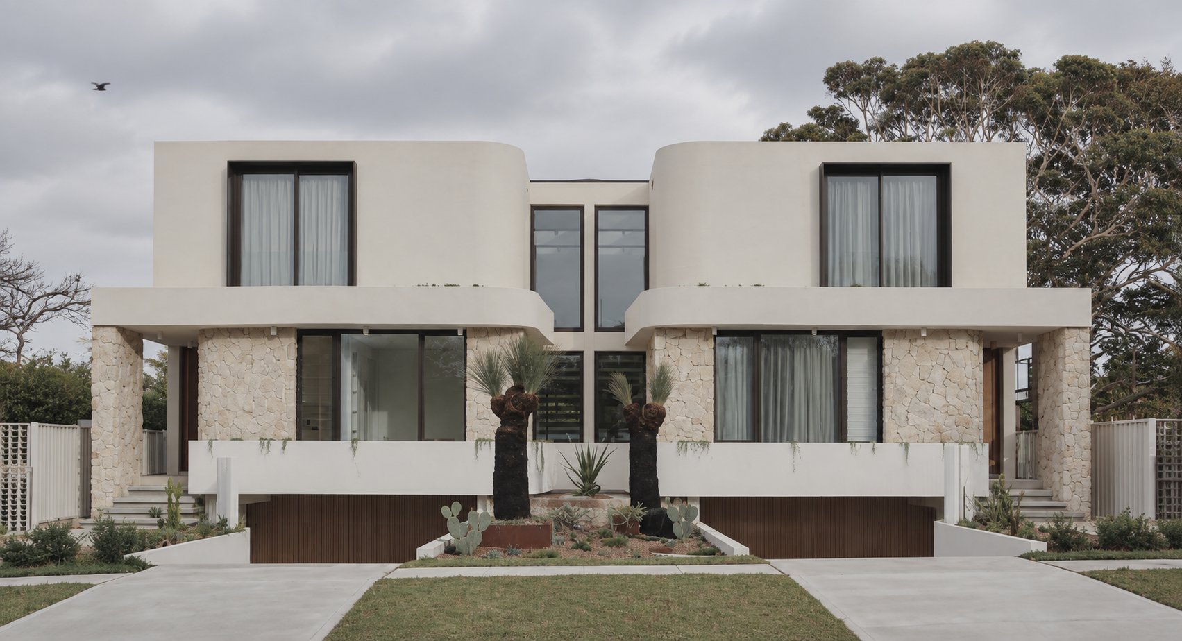Menin Residences in flat overcast light